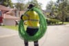 person carrying an NBN Co fibre cable