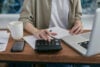 Person using a calculator stock image
