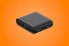 TP-Link TL-WR3002X travel router orange background
