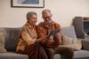 Elderly couple using an iPad