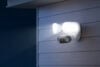 Reolink Elite Floodlight WiFi security camera on house nighttime