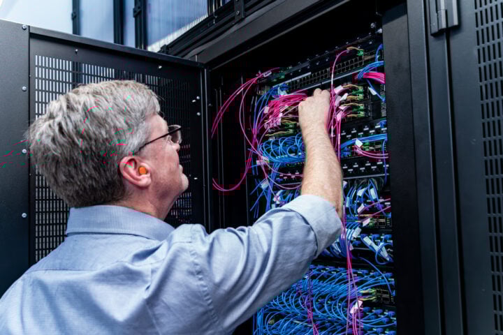 Guy working on AI super computer