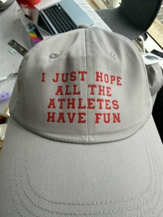 Custom cap with I hope all the athletes have fun slogan