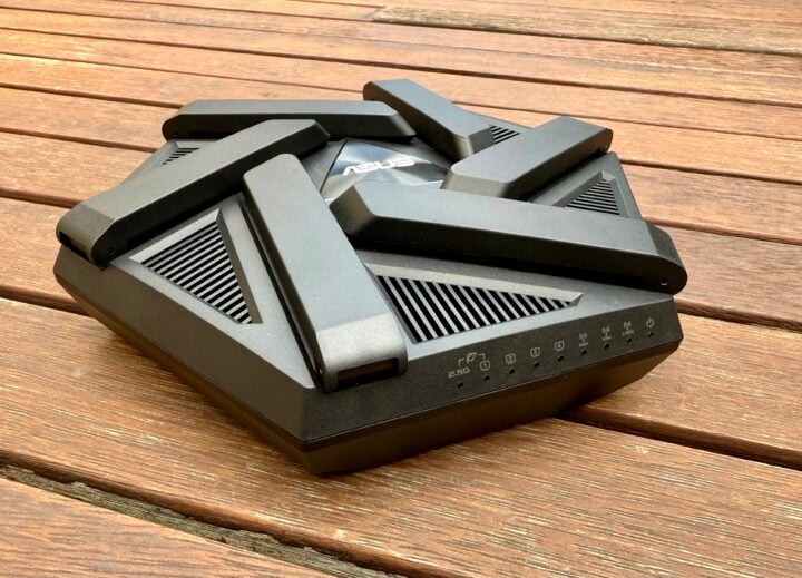Asus RT-AXE7800 router with its antennae folded in