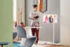 LG StanbyMe 2 woman standing alongside