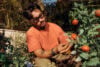 Meta Ray-Ban Display glasses outdoors picking tomatoes