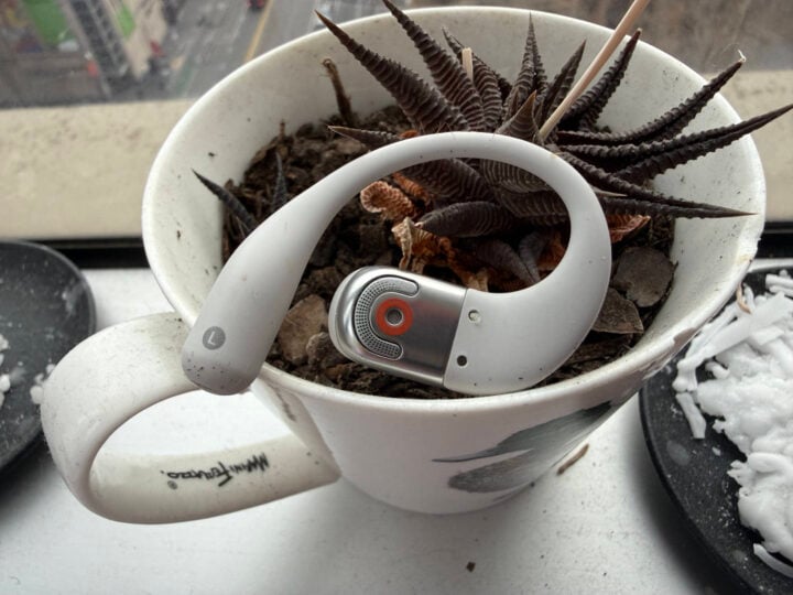Shokz OpenFit 2+ earbud in plant