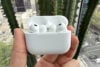 Apple AirPods Pro 3 in case held in hand