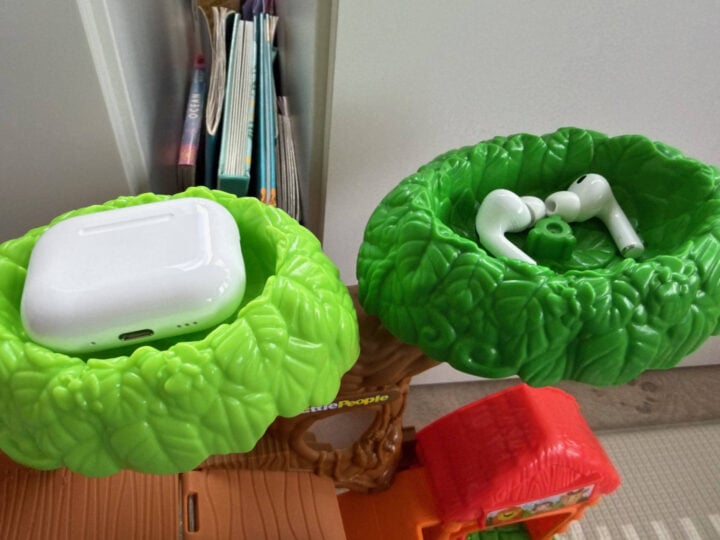 Apple AirPods Pro 3 on top of toy tree