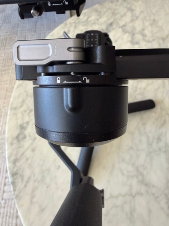 Arm and locking mechanism