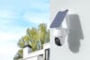 Reolink Argus PT Ultra camera with solar panel on outdoor wall