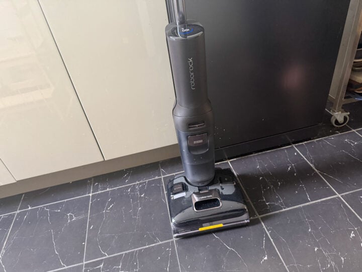 Roborock F25 Ultra wet-dry vacuum standing upright on dark tiles