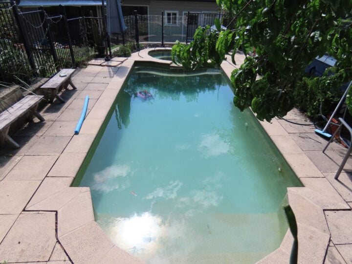 backyard swimming pool with robot cleaner