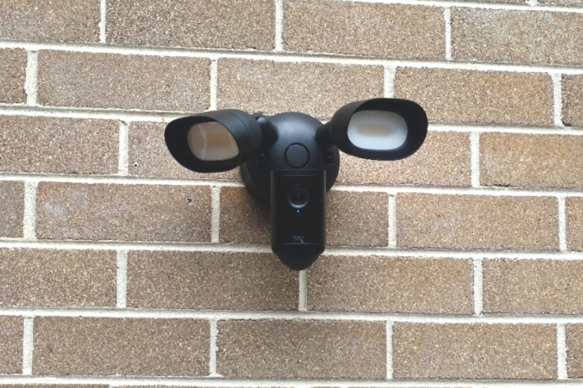 Black Ring Floodlight Camera Pro 2nd Gen on brick wall