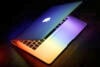 MacBook colourful lighting stock image