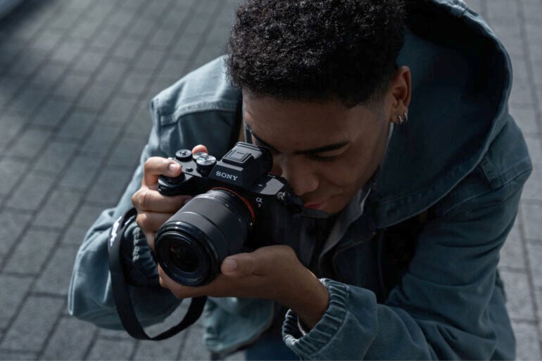 Sony Alpha 7 V model taking photo