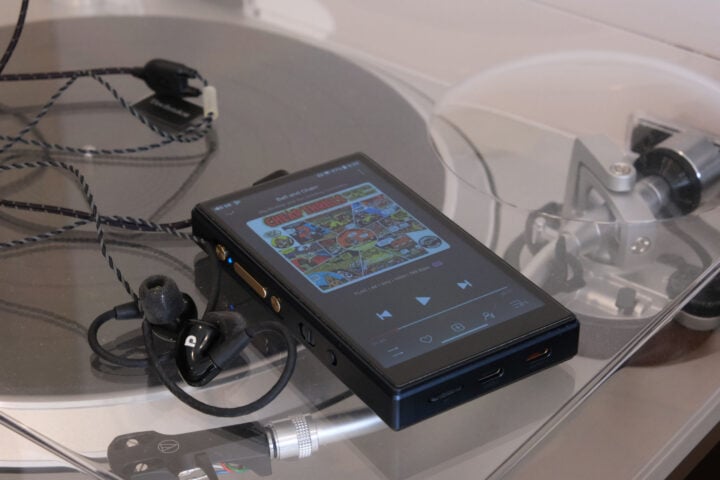 FiiO M21 with in-ear headphones