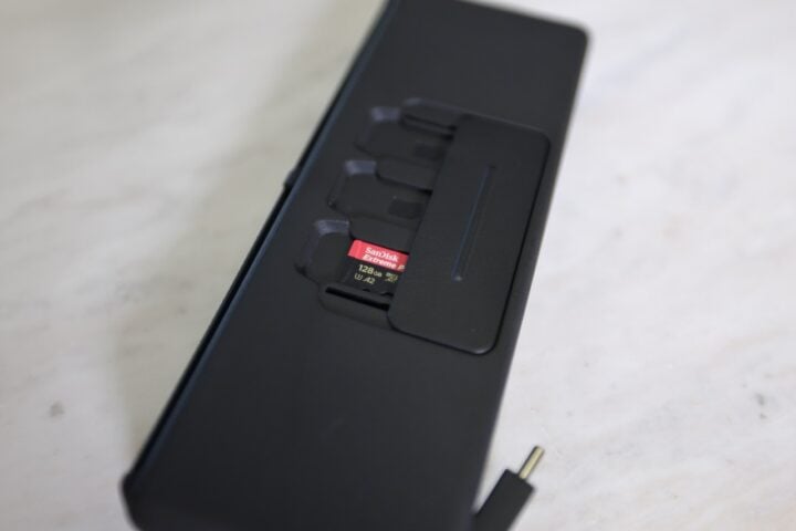 Insta360's battery charger showing MicroSD card slots