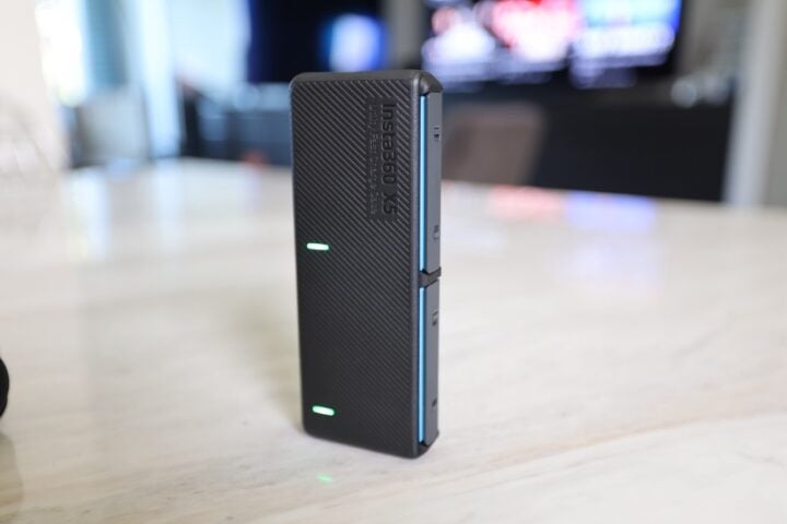 Insta360's battery charger with green LED lights
