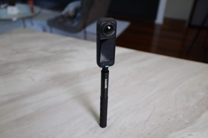 Insta360 selfie stick with Insta360 X5, collapsed