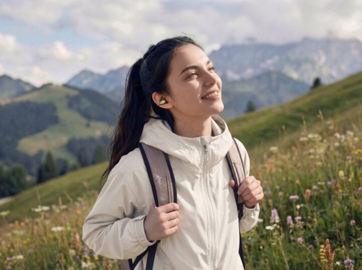 Hiking woman wearing Oppo Enco Clip 2