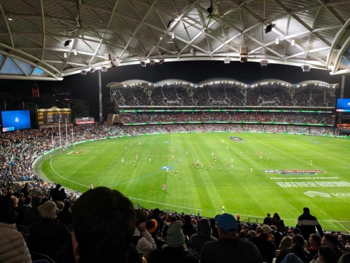 Night footy stadium scoreboard zoomed out photo