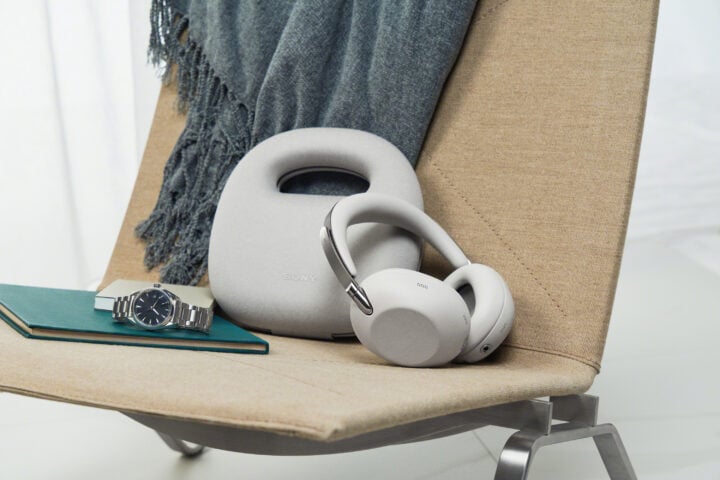 Sony 1000X THE COLLEXION in Platinum on chair with watch