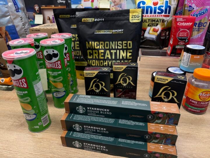 Creatine, Pringles, L'OR and Starbucks coffee capsules and Finish dishwasher tablets on a table