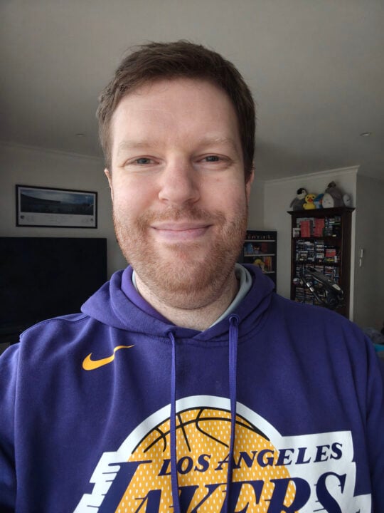 Chris selfie in purple hoodie