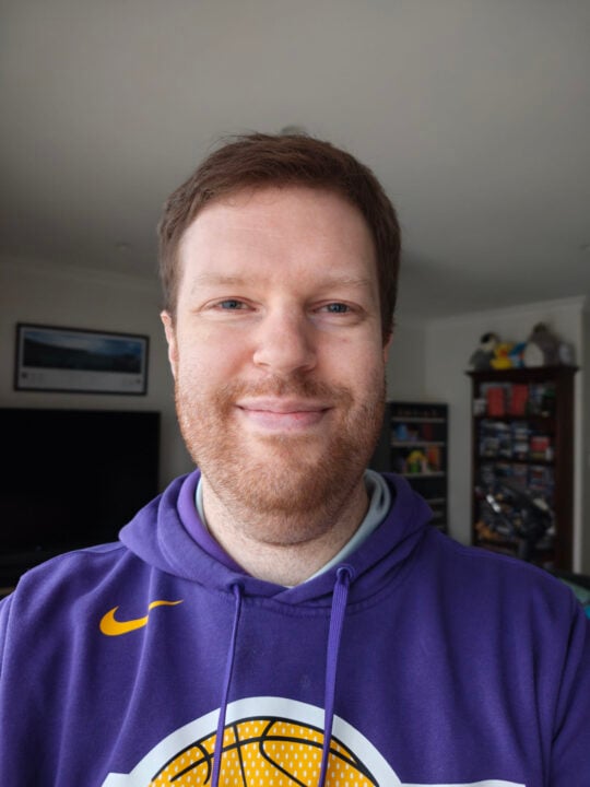 Chris selfie in purple hoodie