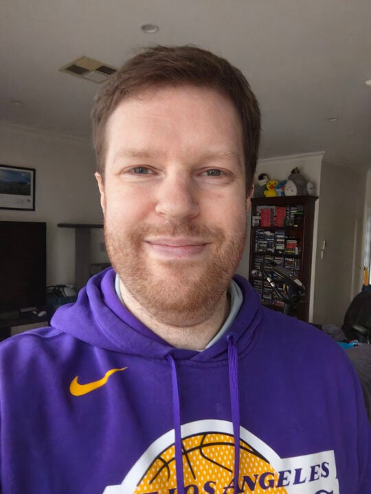 Chris selfie in purple hoodie