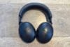 Bose QuietComfort Gen 2 headphones on wooden floor