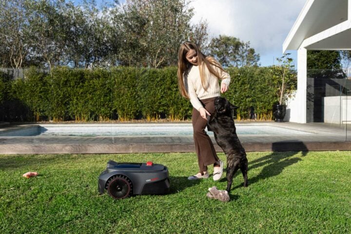 Mova ViAX 300 robot lawnmower with girl and dog