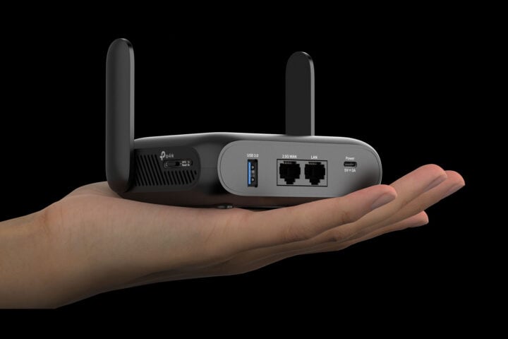 TP-Link Roam 7 held in someone's hand