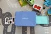 Cricut StickerPix machine surrounded by Duplo