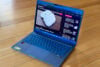 Asus Zenbook 14 UX3480QA laptop on wooden desk