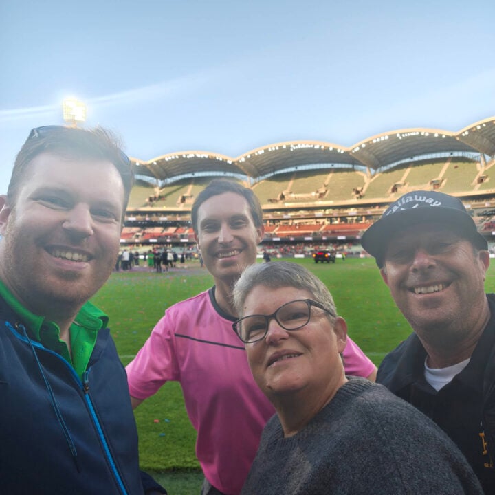 Photo of a family at a football stadium