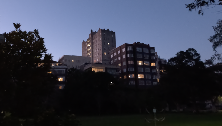 Low light video of buildings and sky from GoPro Mission 1 Pro