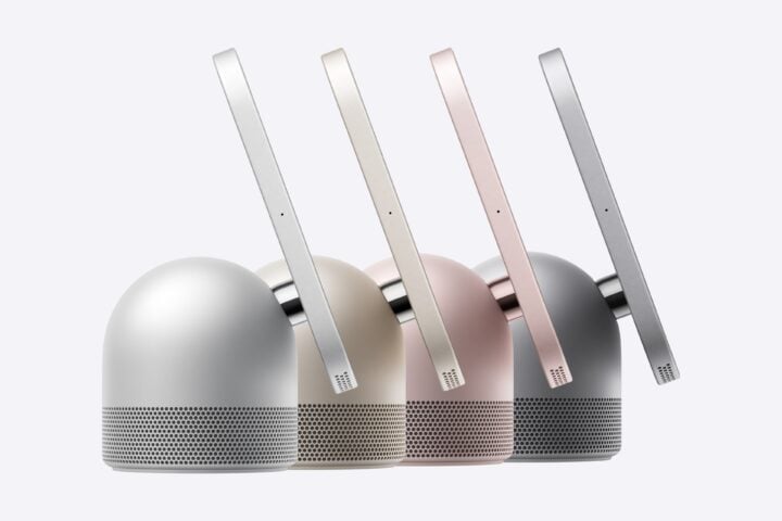 Side view of four Apple HomeView tabletop models in silver, starlight, rose pink and space grey, showing the domed speaker base and stainless steel hinge